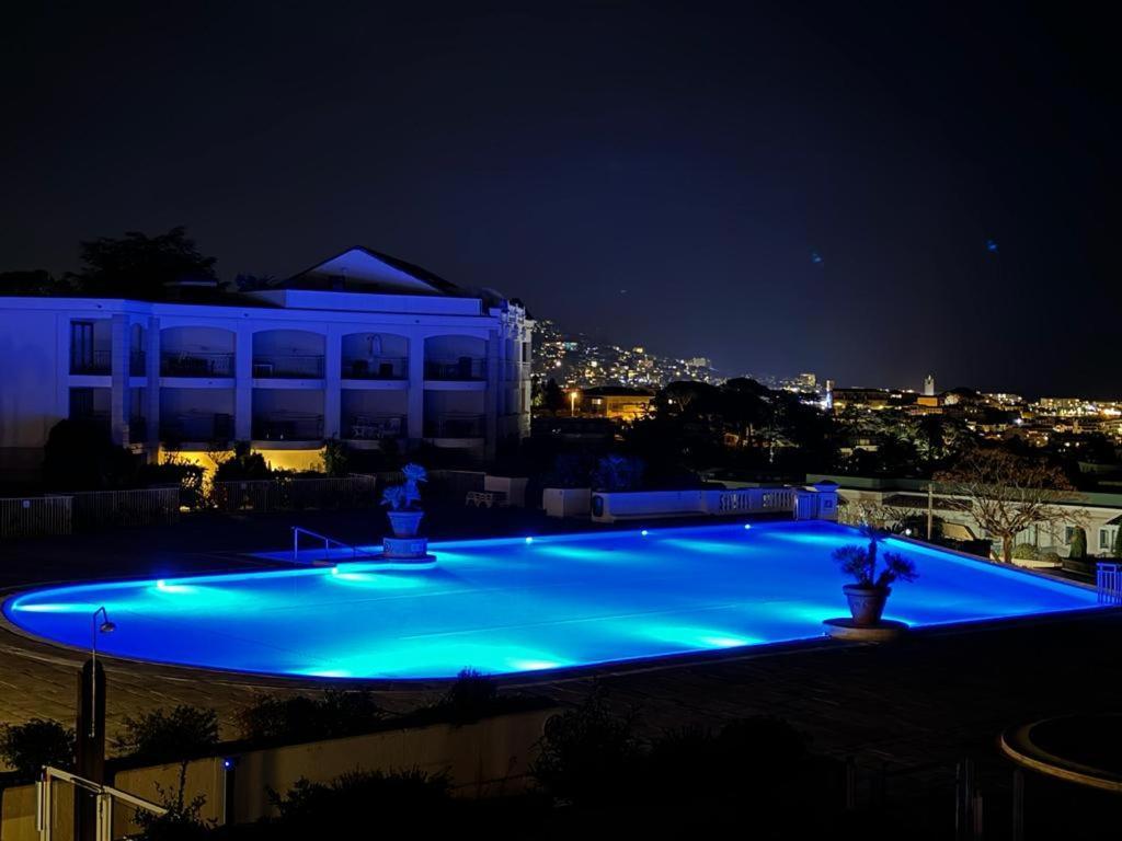 Appartement Studio Vue mer et Piscine Climatisation Wifi