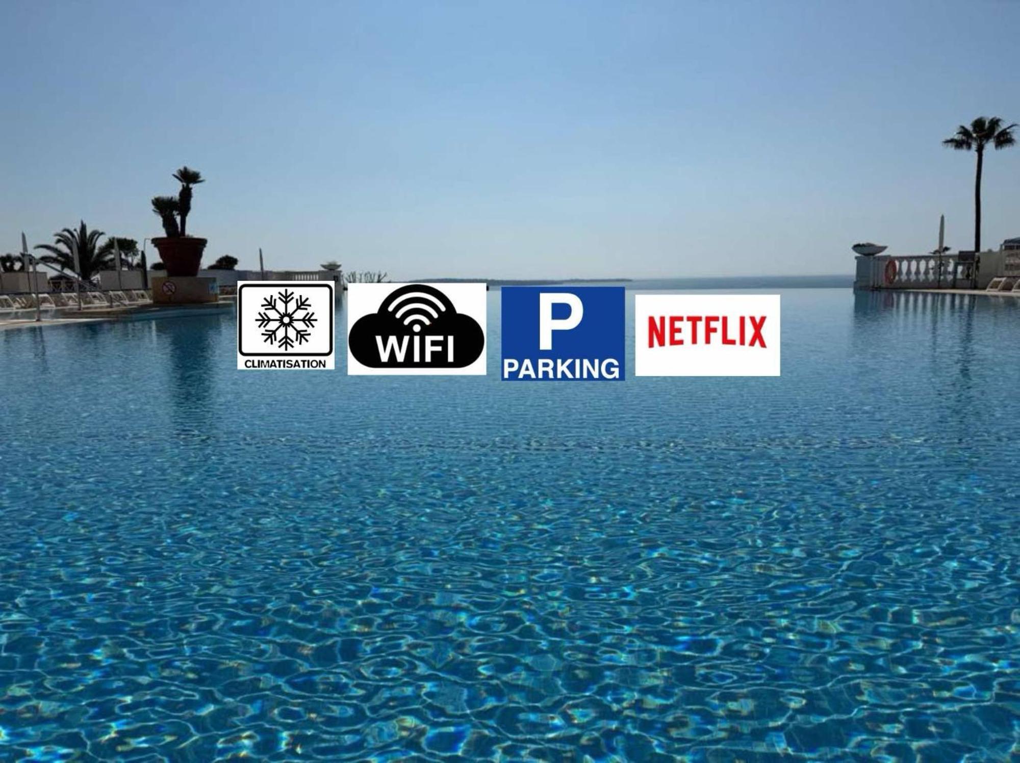 Appartement Studio Vue mer et Piscine Climatisation Wifi